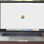 How to stop spinning color wheel on Mac